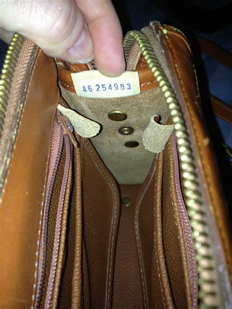 how to spot fake dooney and bourke bags